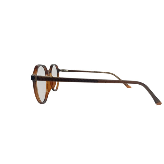 T20 Opticals Growth 1002 round brown plastic eyeglasses shown from a side profile view.