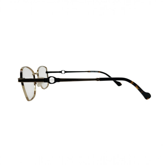 T20 Opticals Vintro Club cat eye glasses with gold metal frame and tortoiseshell acetate temples, side view.