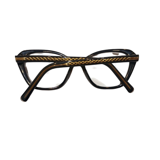 T20 Opticals Agnes Bi 2271 black acetate cat eye glasses with gold chain detail on the frame front
