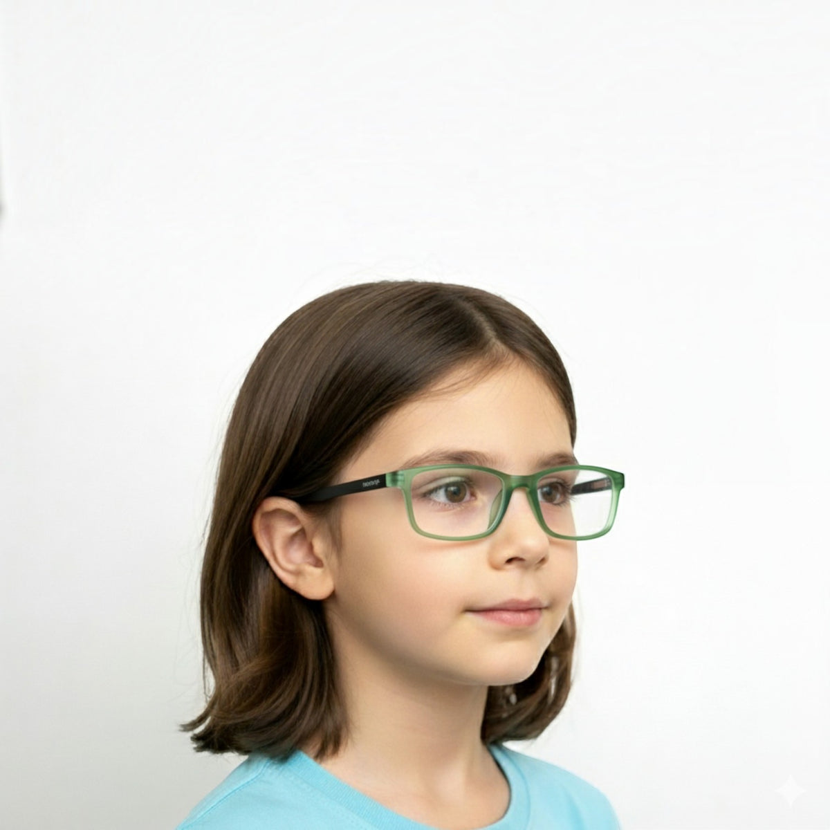 A young girl wearing T20 Opticals EYERUS KIDS 3340 two-tone green and black rectangular plastic prescription glasses.