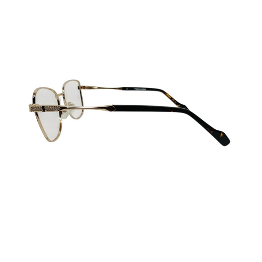 T20 Opticals Vintro Club cat eye eyeglasses featuring gold metal frames with textured details and dark temple tips.